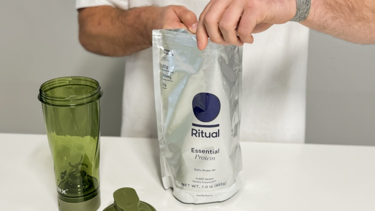 Our tester cracks open a bag of Ritual Essential Protein 18+ Protein Powder