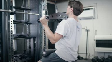 Barbend tester Jake Herod works out on a Force USA Trainer