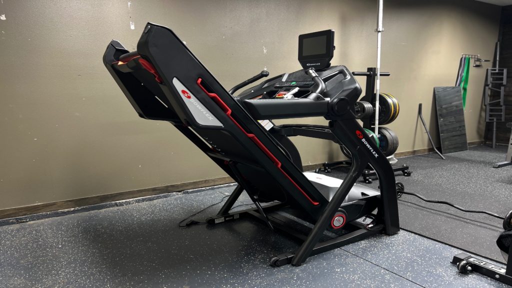 A BowFlex Treadmill 10 is shown folded up.