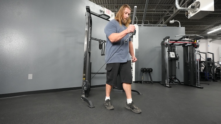 Our tester working out with the Titan Fitness Functional Trainer