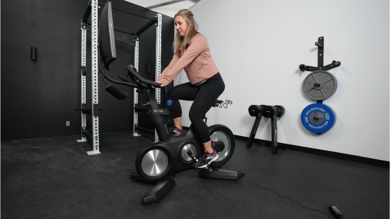 A BarBend tester riding the Echelon Connect EX-8s.