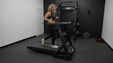 a person running on the Echelon Stride 4s treadmill