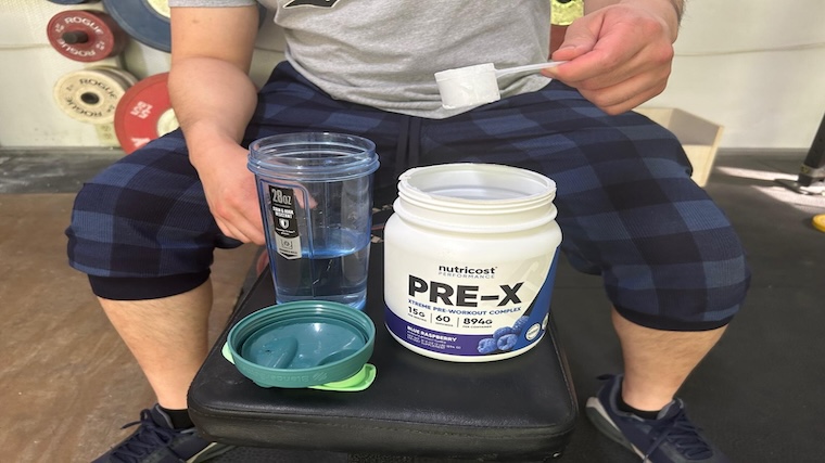 Our tester mixing Nutricost Pre-X Pre-Workout