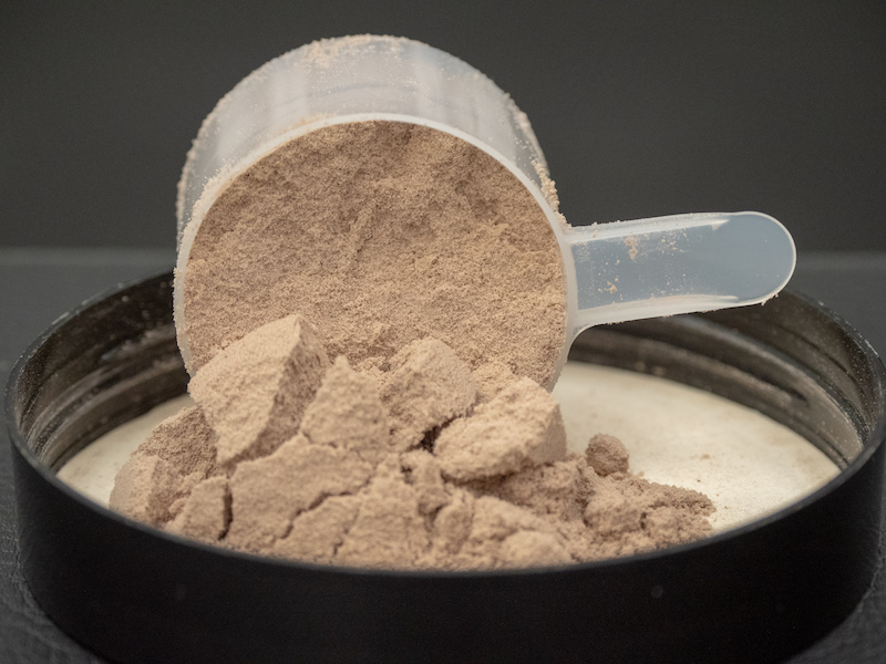 A scoop of MuscleTech protein powder. 