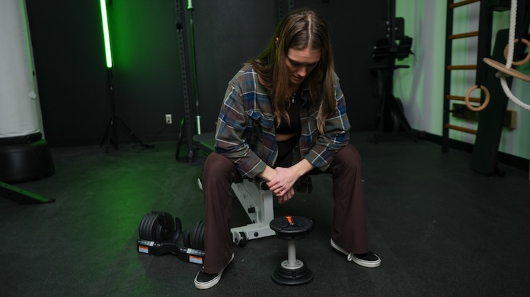 Our tester training with the NordicTrack Select-A-Weight Dumbbells