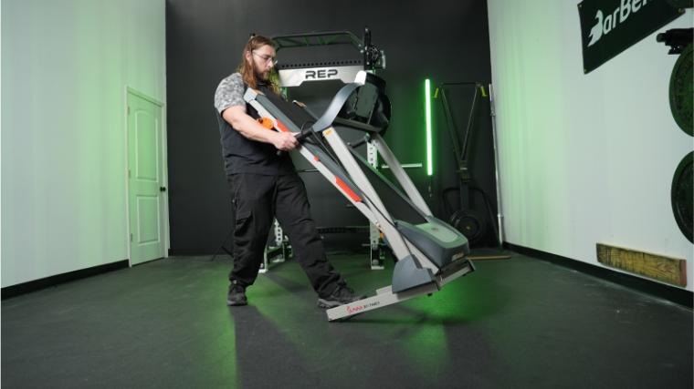 Our tester moving the Sunny Health & Fitness SF-T4400.