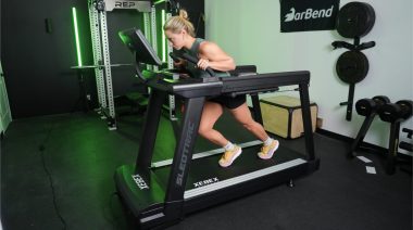 a person performing a sled push on the Xebex ST-6000 Treadmill