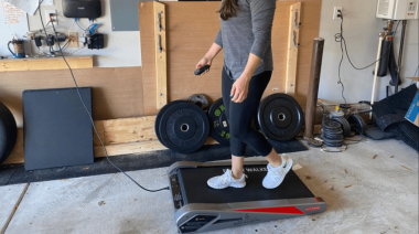 Our tester walks on a treadmill, preparing for the EgoFit Walker review.